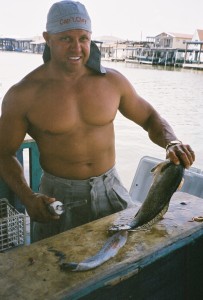 Capt. Clay Cleaning Beautiful Speckled Trout