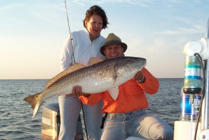 Capt. Clay Showing Off Her 1st Bull Red