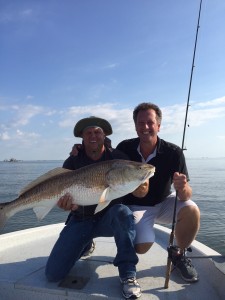 Capt. Clay With This Guys 1st Bull Red