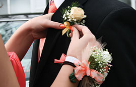 prom couple waiting for limo