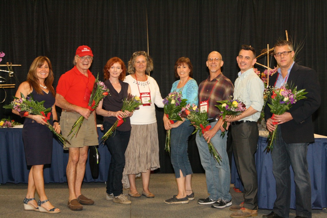 Jan Wemple (third from right) and Michael Thompson (second from right) accept multiple awards on behalf of Moore Landscapes at the annual TPIE Awards in South Florida.